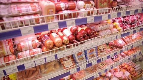 Different kinds of meat products and sausages on the display, close-ups Stock Footage 75488554