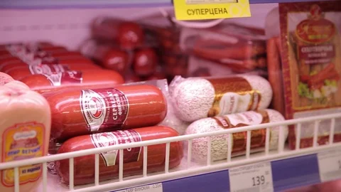 Different kinds of meat products and sausages in the grocery store Stock Footage 75488692