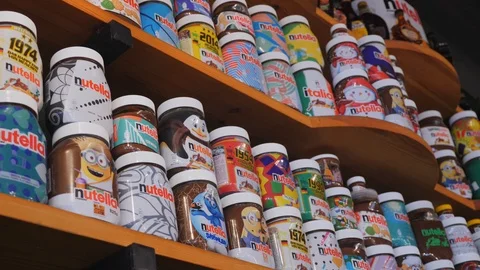 Different kinds of Nutella glasses being shown with different designs. Stock Footage 116840101