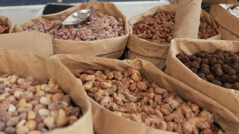 Different kinds of nuts in craft paper bags Video stock 96266801