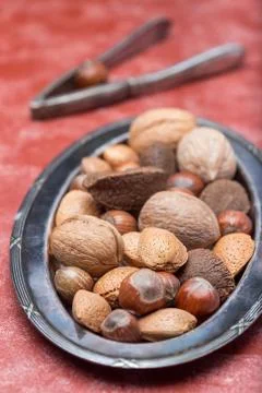 Different kinds of nuts in shell, hazelnut, walnut, almond and brazil nuts 스톡 사진