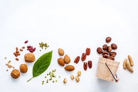Different kinds of nuts . Walnuts,almonds ,pecan ,pea nuts, pistachio, pint.. Stock Photos