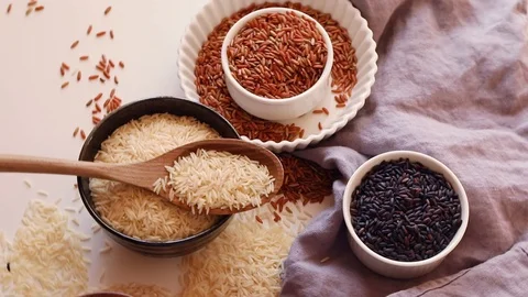 Different kinds of rice grains. Top view Stock Footage 89753372