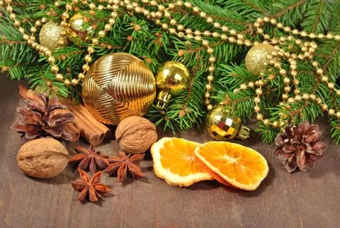 Different kinds of spices, nuts, cones and dried oranges, Christmas de Stock Photos