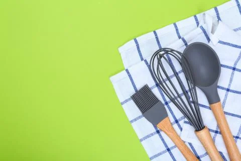 Different kitchenware on a colored background top view. Cooking appliances. Stock Photos