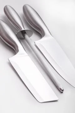 Different knives with sharpener Stock Photos