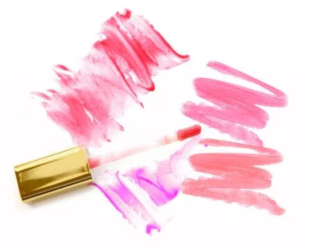 Different lip glosses isolated on white Stock Photos