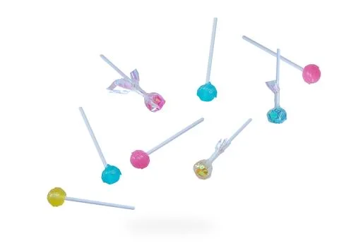 Different lollipopsfalling on white background with clipping path.  Stock Photos