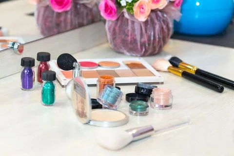 Different makeup items on the table Stock Photos