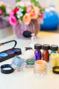 Different makeup items on the table Stock Photos