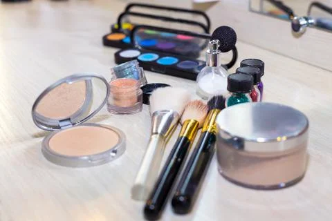 Different makeup items on the table Stock Photos