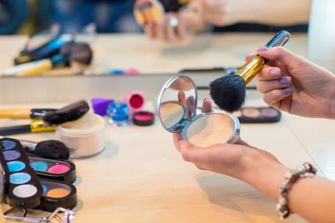Different makeup items on the table Stock Photos