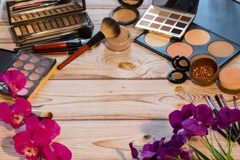 Different makeup items on the table Stock Photos