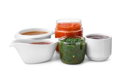 Different marinades in tableware isolated on white Stock Photos