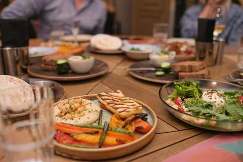 Different meals for the guests on the restaurant table Stock Photos
