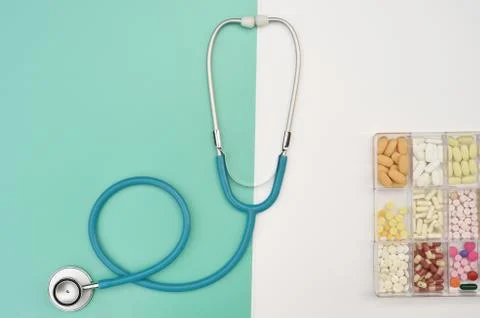 Different medication with stethoscope Stock Photos