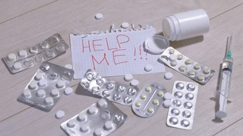 Different medicinal tablets on the floor. Suicide Stock Footage 111522738