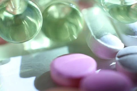 Different Medicine Tablets Stuff. Pharmacy Background. Macro Closeup. Stock Photos