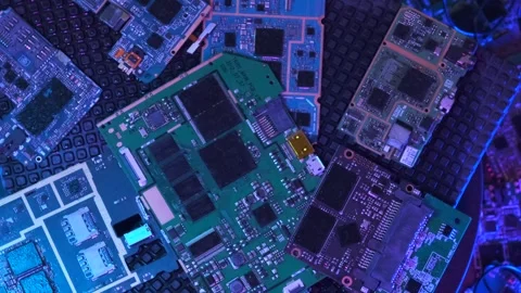 Different microcircuits from phone and tablets on a rotating showcase Stock Footage 270453766