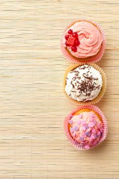 Different muffins with cream Stock Photos