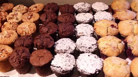 Different muffins flavours in a bakery Stock-Footage 133206902