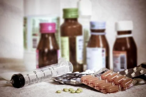 Different multi Pills and tablets isolated on white background. Stock Photos