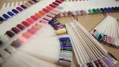 Different nail templates colored with the different polishes Stock Footage 73445933