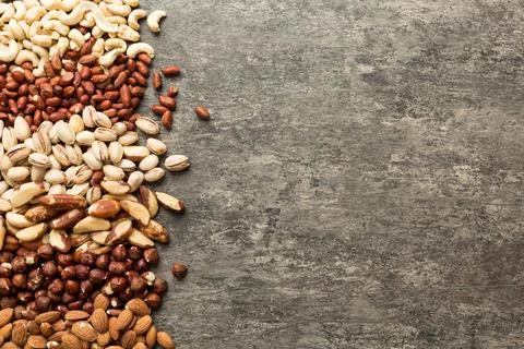 Different nuts frame background. Close up, top view, flat lay with vopy spa.. Stock Photos