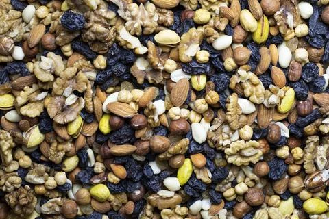 Different nuts in a heap Stock Photos