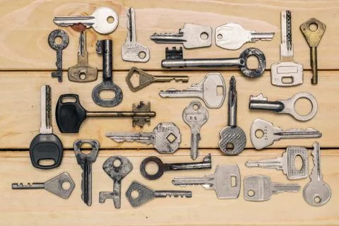 Different old keys randomly top view Stock Photos