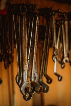 Different organized metal spanner tools in a garage Stock Photos