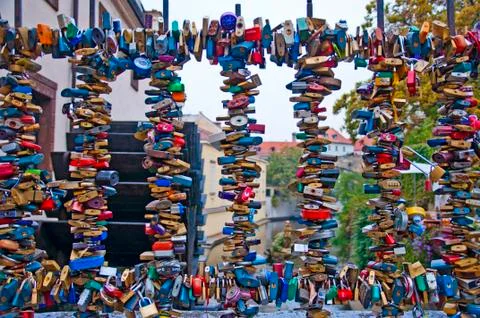 Different padlocks on railing Stock Photos