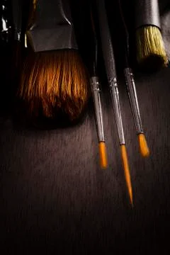 Different Paint Brushes in Dark Environment Stock Photos