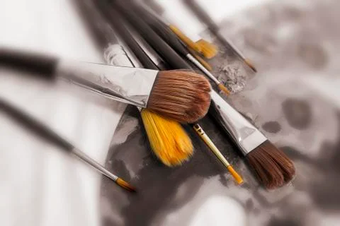 Different Paint Brushes on Palette Stock Photos
