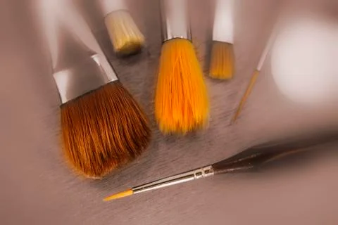 Different Paint Brushes on Palette Stock Photos