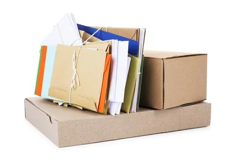 Different paper envelopes and parcels on white background. Post office 스톡 사진