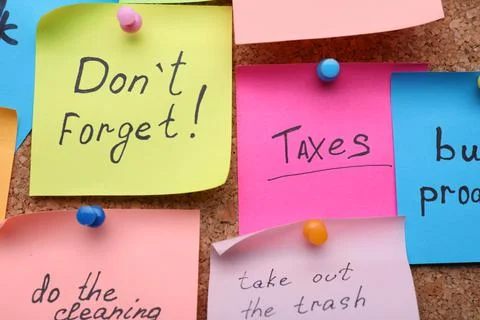 Different paper notes on cork board, closeup Stock Photos