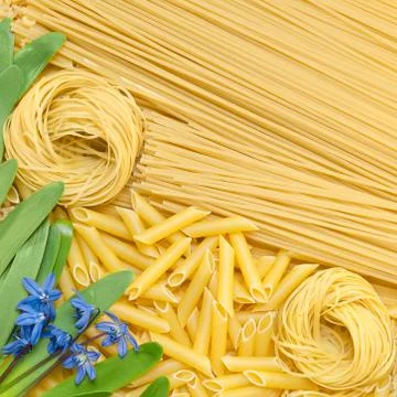Different pasta lie on the surface 写真素材