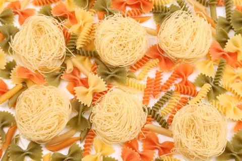 A different pasta in three colors. Stock Photos