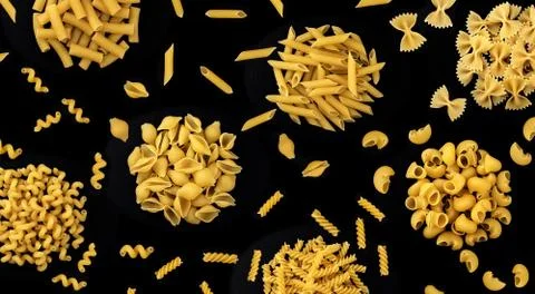 Different pasta types on black background, italian food texture, top view Stock Photos