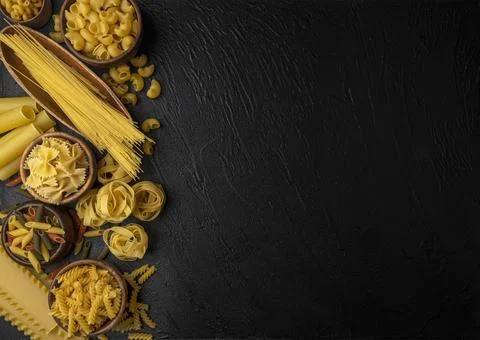 Different pasta types on blue background, top view Stock Photos