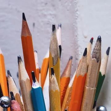 Different pencils in a jar on the table 写真素材