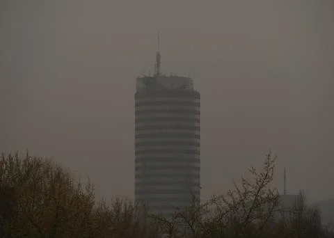Different perspective at a tower while foggy weather in jena Stock Photos