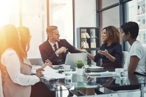 Different perspectives for one shared goal. a group of colleagues having a Stock Photos