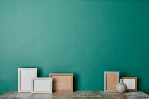 Different photo frames vase green Foto stock