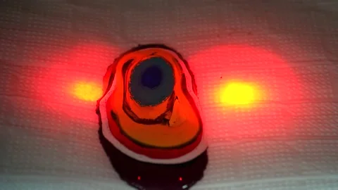 Different pigments drip on top of each other to mix into a certain color. Video stock 220679097