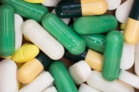 Different pills and tablets close-up. Medical background. Macro. Top view. Foto stock