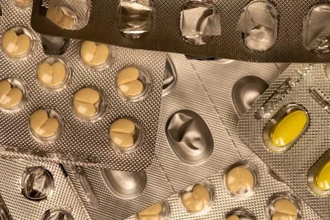 Different pills in blisters. Close-up, selective focus Stock Photos