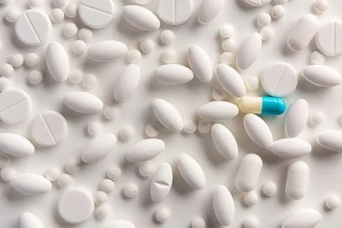Different pills on white background. Flat lay. Stock Photos