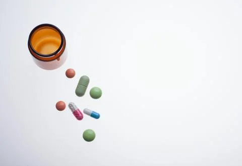 Different pills on white background Stock Photos